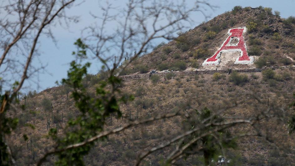 Tucson's "A" Mountain painted red in support of #RedforEd